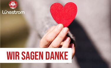 Hand hält rotes Herz, davor Schriftzug "Wir sagen Danke"